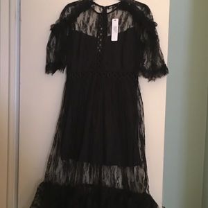 Never worn black dress with lace detail